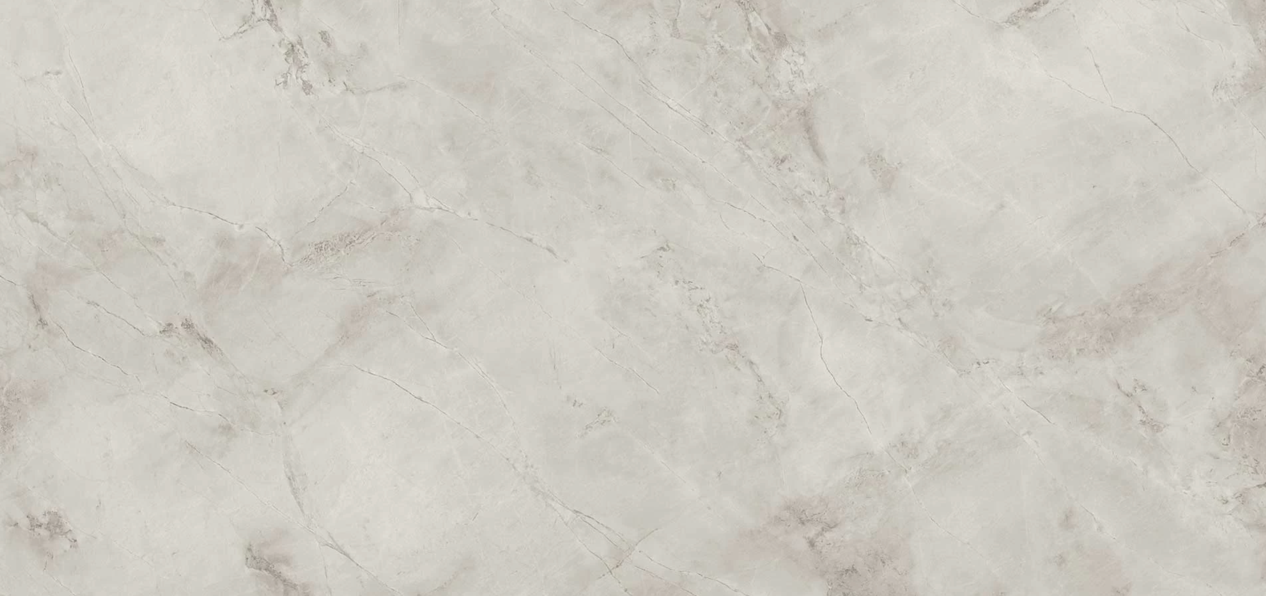 White Cloud marble surface with soft cream tones and delicate gray veining — custom countertops fabricated and installed by Signature Stone LV