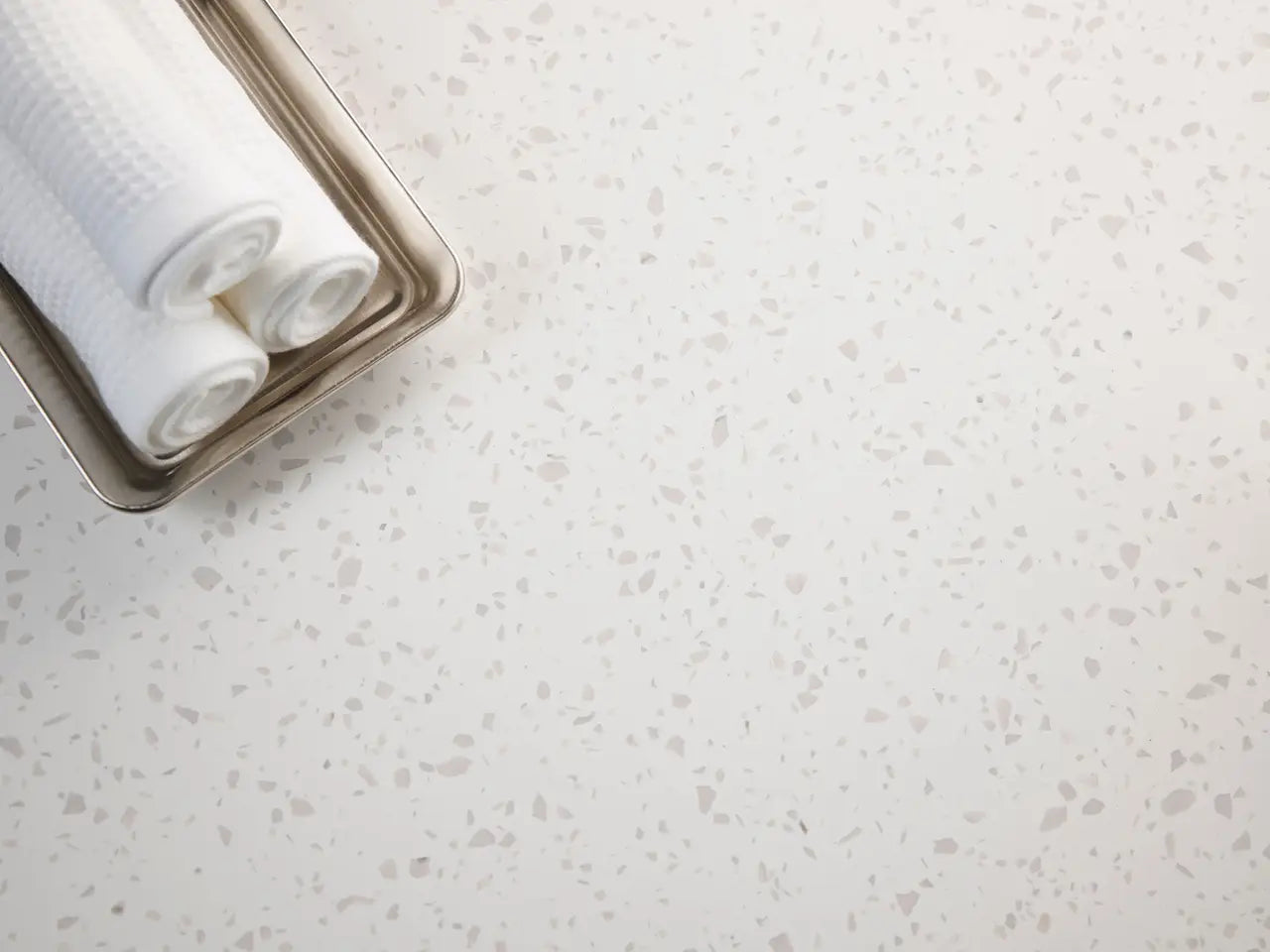 Salt Lake quartz bathroom countertop with white base and subtle gray veining — custom countertops fabricated and installed by Signature Stone LV