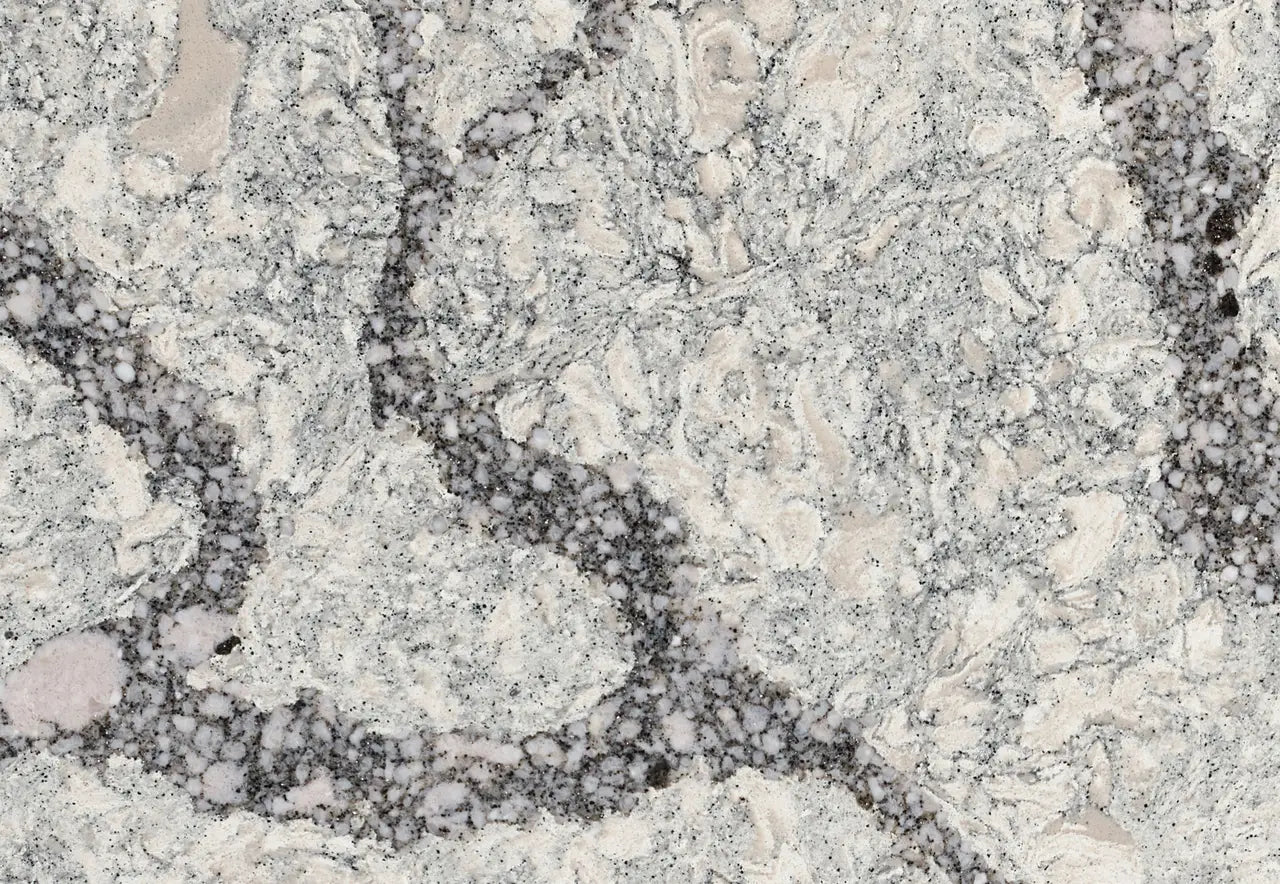 Seagrove granite surface with gray and beige marbled patterns and speckled texture — custom countertops fabricated and installed by Signature Stone LV