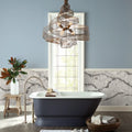 Calacatta marble bathroom wainscoting with dramatic gray veining and polished finish — elegant stone countertops installed by Signature Stone Las Vegas
