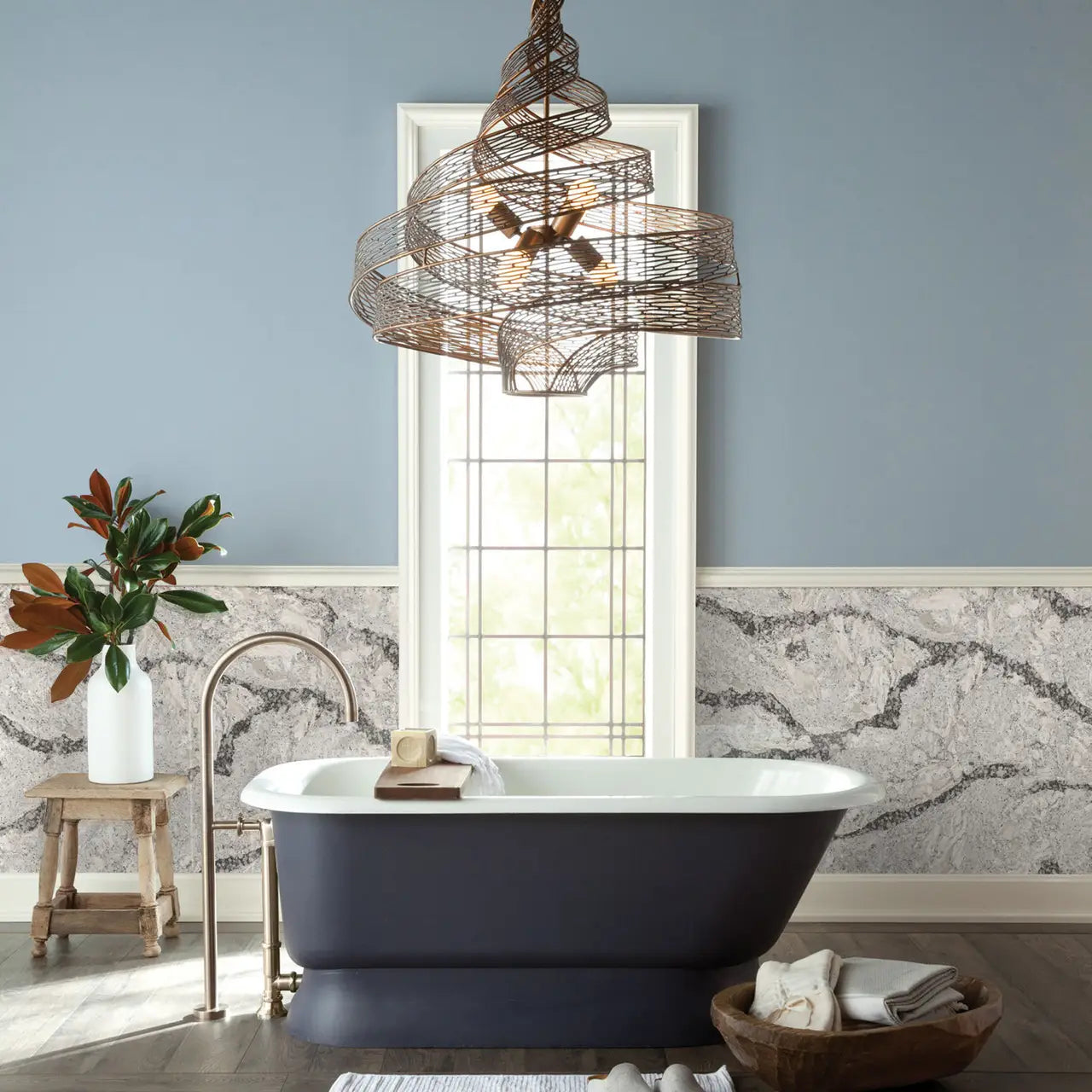 Calacatta marble bathroom wainscoting with dramatic gray veining and polished finish — elegant stone countertops installed by Signature Stone Las Vegas