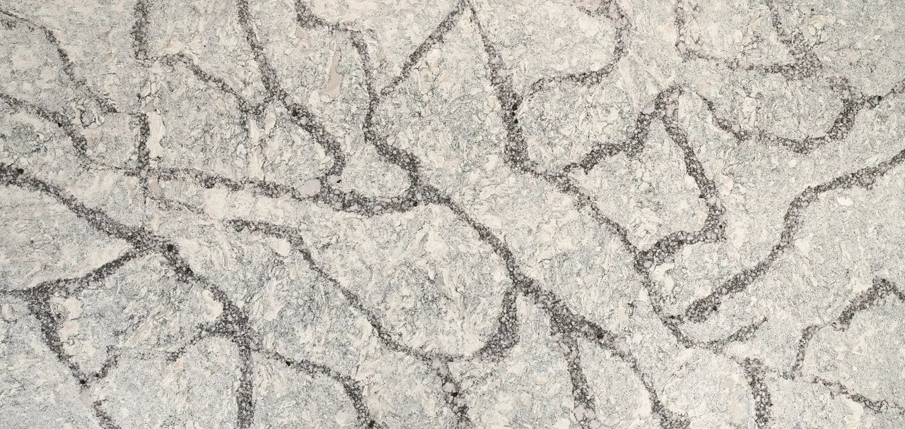 Seagrove quartz surface with light beige background and intricate gray veining pattern — premium countertop fabrication by Signature Stone Las Vegas