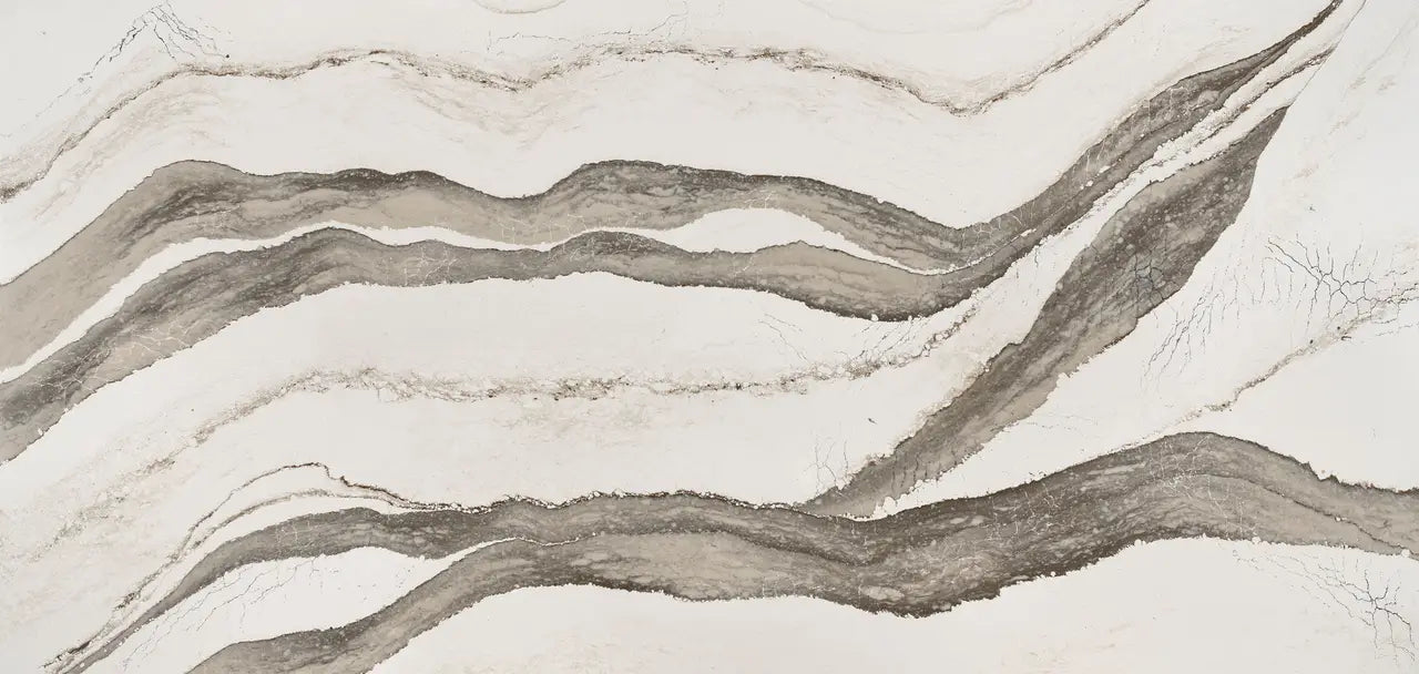 Skara Brae quartz surface with flowing gray and white veining patterns — custom countertops fabricated and installed by Signature Stone LV
