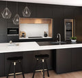 Quartz kitchen island with white veined surface and sleek edges — modern stone countertops installed by Signature Stone Las Vegas