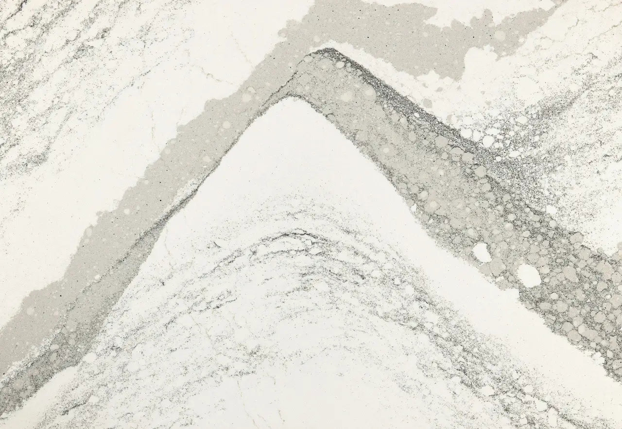 Quartz slab surface with elegant white and gray veining and polished finish — beautiful custom countertops fabricated and installed by Signature Stone LV