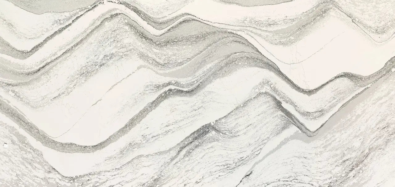 Natural stone surface with flowing white and gray veined patterns and polished finish — premium countertop fabrication by Signature Stone Las Vegas