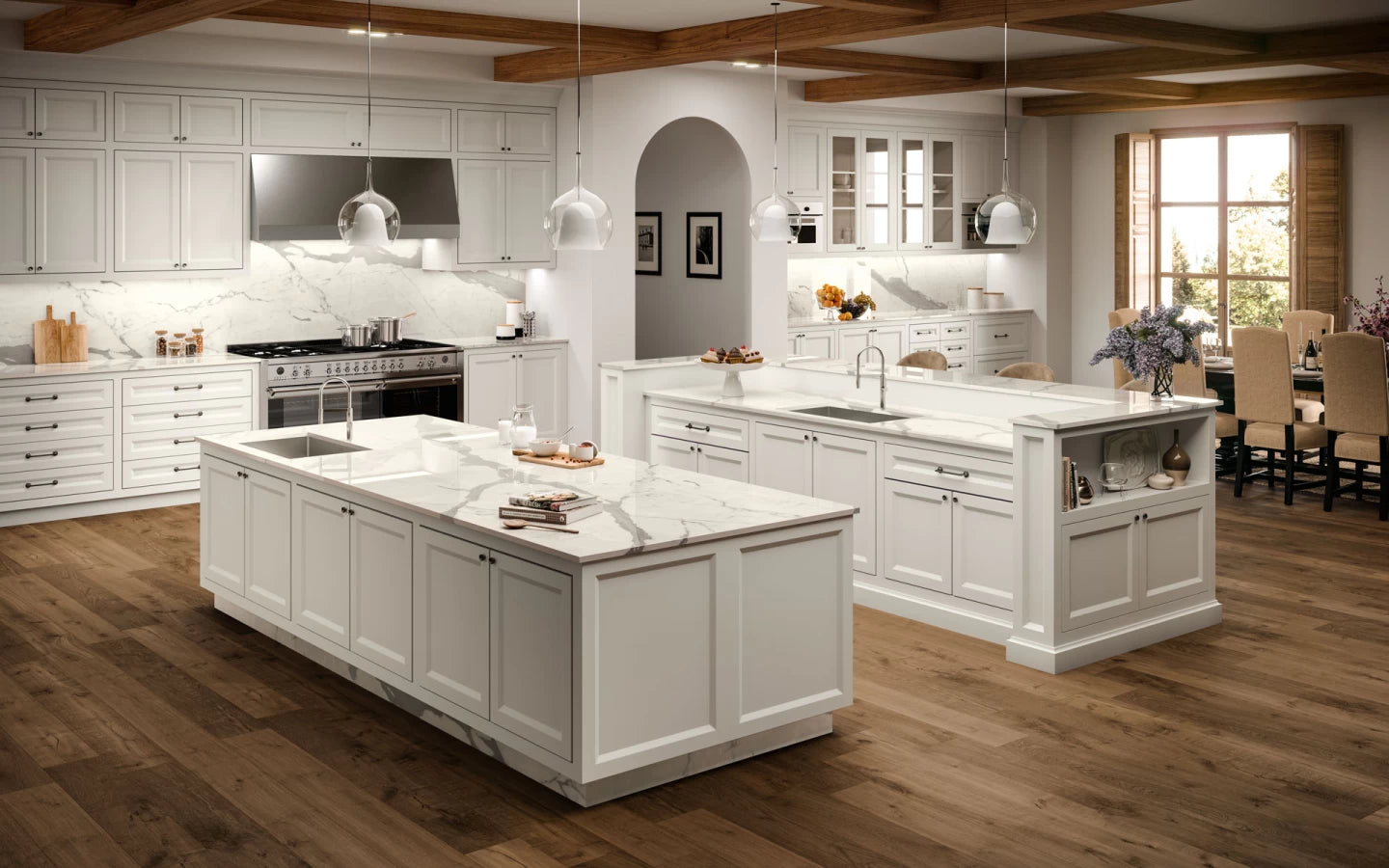 Statuario Supremo kitchen islands with white veined marble surfaces — professional countertop fabrication by Signature Stone Las Vegas