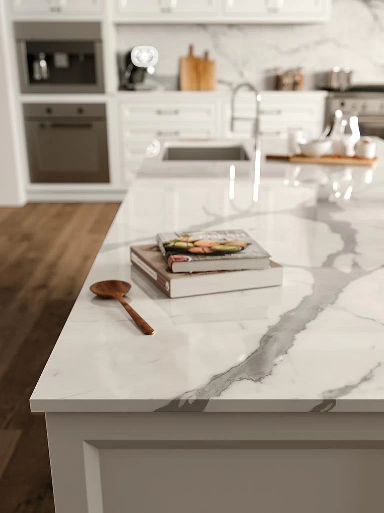 Statuario Supremo marble kitchen island with white veining and polished finish — premium stone countertops installed by Signature Stone Las Vegas