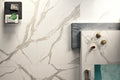 Statuario Premium marble surfaces with white base and gray veining in modern kitchen — elegant stone countertops installed by Signature Stone Las Vegas