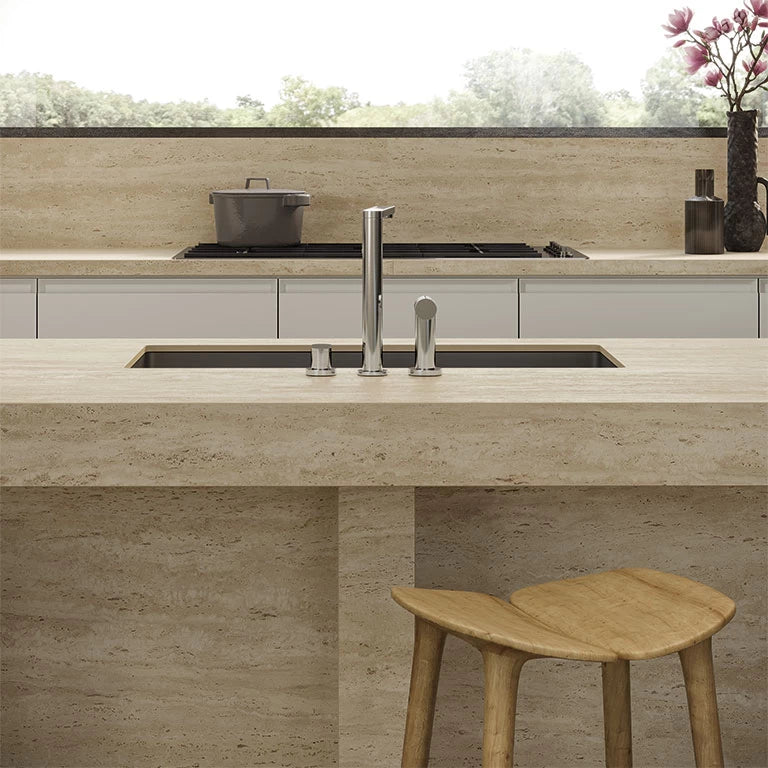 Travertino Sand kitchen island with warm beige tones and natural stone texture — expert countertop fabrication by Signature Stone Las Vegas