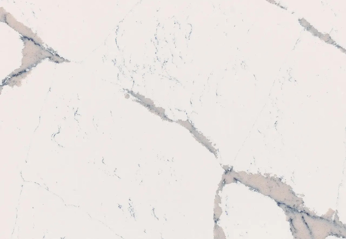 Summerbrook quartz surface featuring soft white base with subtle gray and blush veining — premium stone countertops installed by Signature Stone Las Vegas