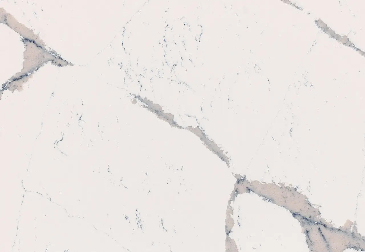 Summerbrook quartz surface featuring soft white base with subtle gray and blush veining — premium stone countertops installed by Signature Stone Las Vegas