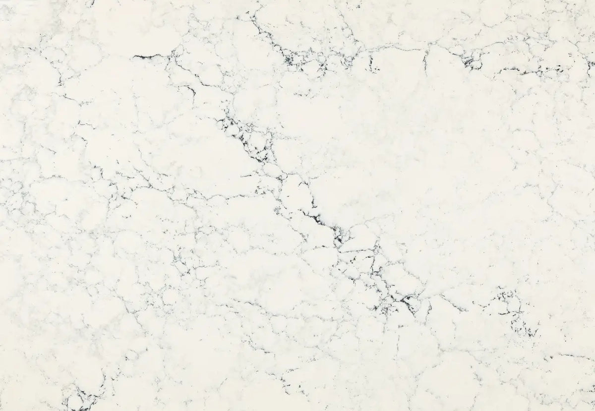 Sutherland quartz surface with white background and gray veining in polished finish — custom countertops fabricated and installed by Signature Stone LV