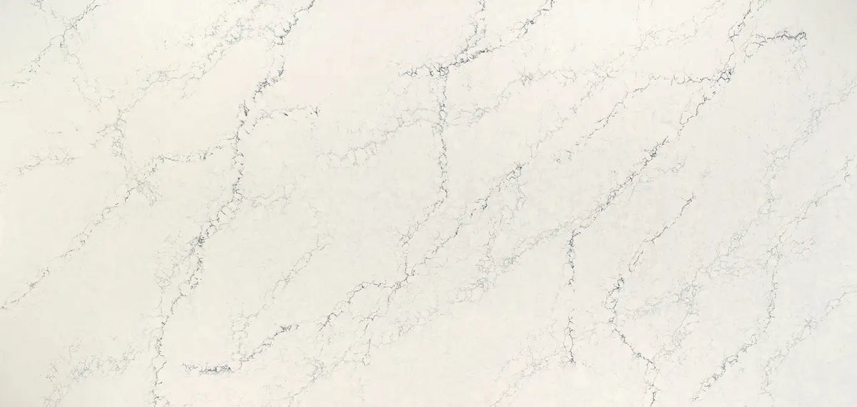 Quartz Sutherland slab with soft cream base and delicate gray veining — elegant stone countertops installed by Signature Stone Las Vegas