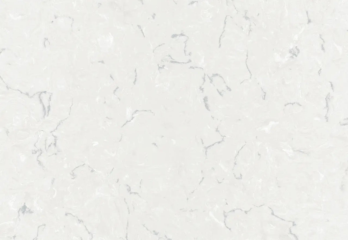 Swanbridge quartz surface with soft white background and subtle gray veining in polished finish — custom countertops fabricated and installed by Signature St...