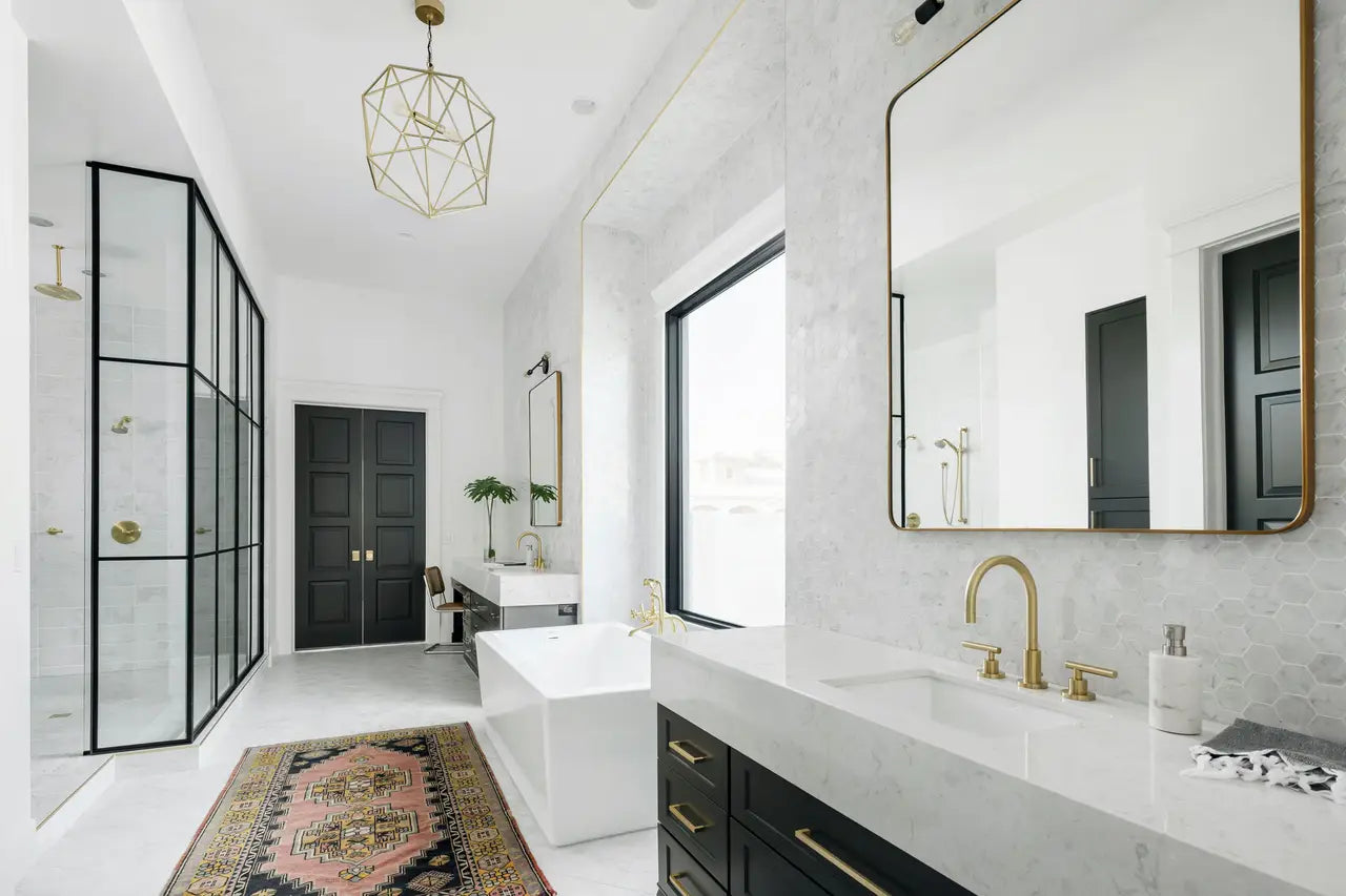 Carrara marble bathroom vanity with white veining and polished finish — elegant stone countertops installed by Signature Stone Las Vegas