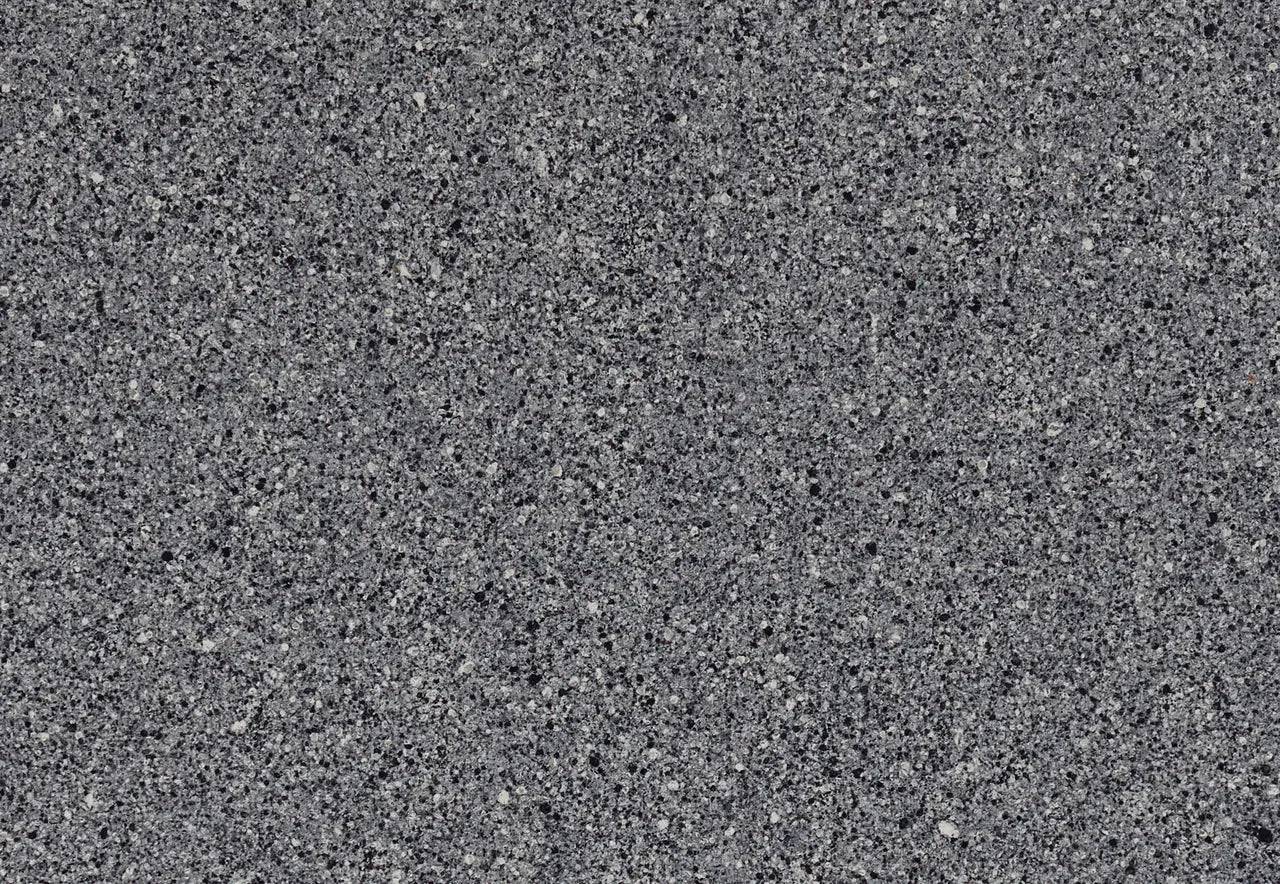 Talbot Gray granite surface with fine speckled pattern and polished finish — premium stone countertops installed by Signature Stone Las Vegas