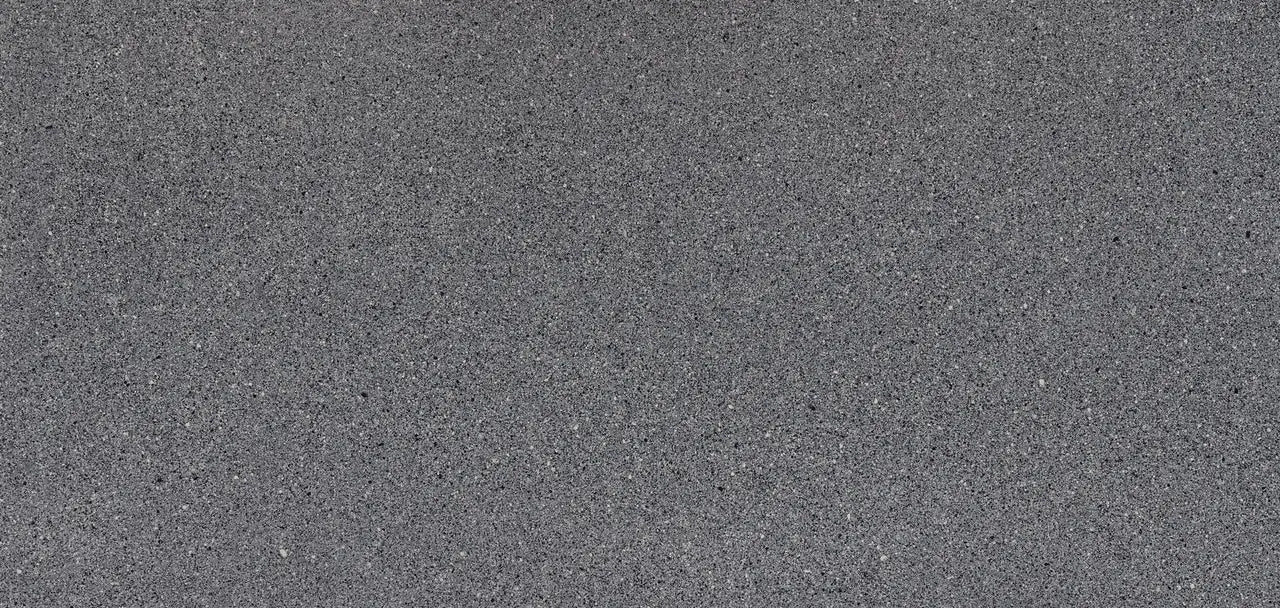 Talbot Gray quartz surface with fine speckled pattern and smooth matte finish — custom countertops fabricated and installed by Signature Stone LV