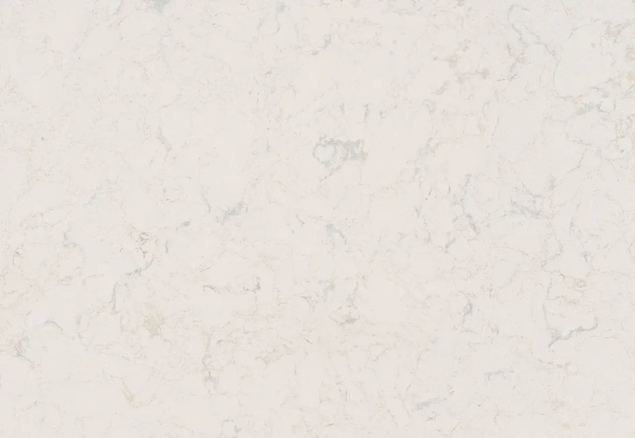Torquay quartz kitchen countertops with cream background and subtle veining — custom countertops fabricated and installed by Signature Stone LV
