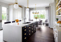 Torquay quartz kitchen island and perimeter countertops with white finish and clean edges — premium stone countertops installed by Signature Stone Las Vegas