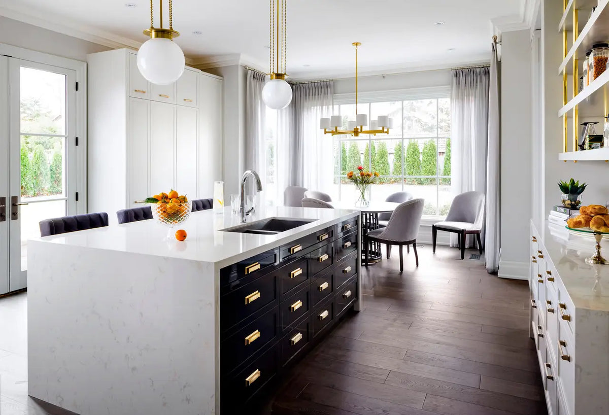 Torquay quartz kitchen island and perimeter countertops with white finish and clean edges — premium stone countertops installed by Signature Stone Las Vegas