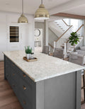 Trafalgar quartz kitchen island with light gray veining and polished finish — elegant stone countertops installed by Signature Stone Las Vegas