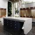 Travella quartz kitchen island with waterfall edge and white marble veining — premium stone countertops installed by Signature Stone Las Vegas