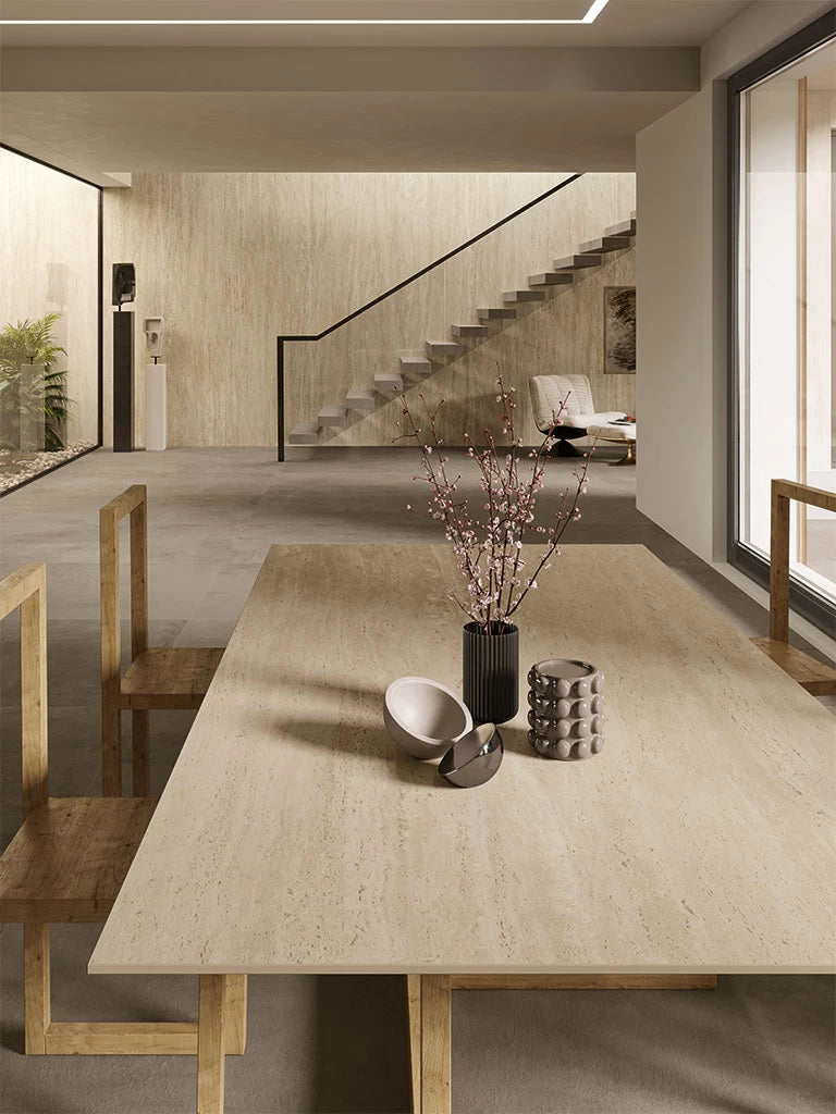 Travertino Sand dining table surface with warm beige tones and natural texture — premium stone countertops installed by Signature Stone Las Vegas
