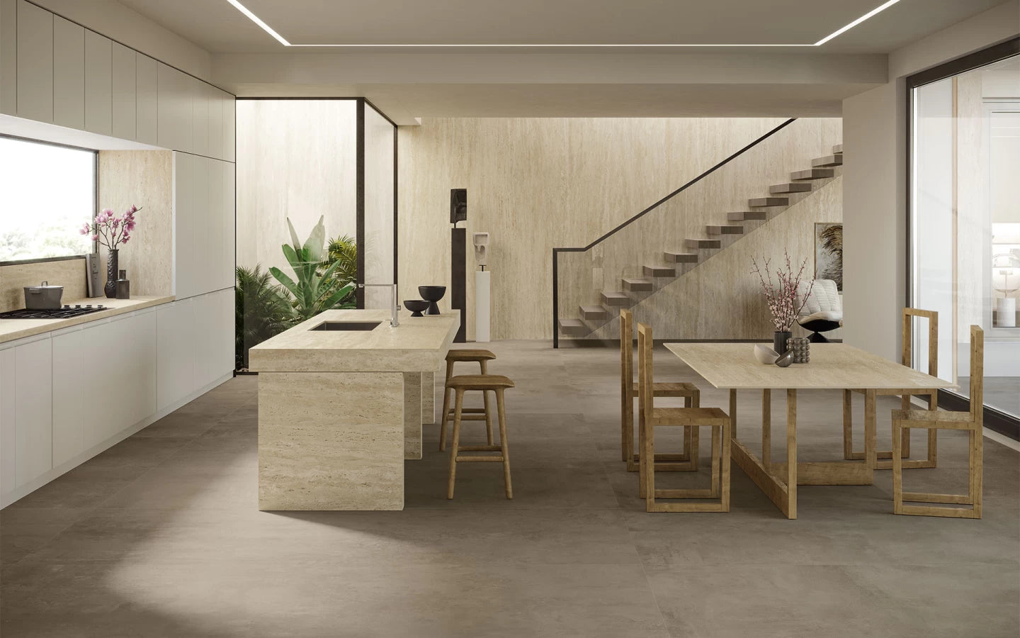 Travertino Sand kitchen island and dining table with warm beige tones and smooth finish — custom countertops fabricated and installed by Signature Stone LV