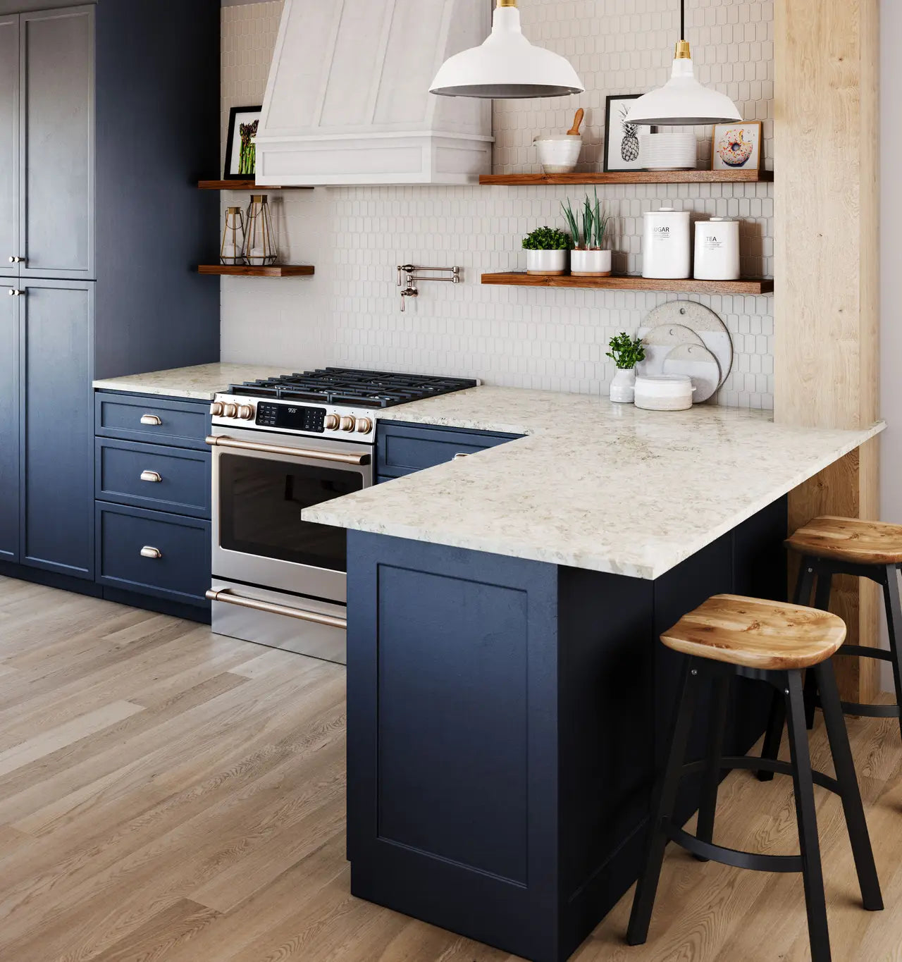 Warwick quartz kitchen island and perimeter countertops with light veining in navy blue cabinetry — premium stone countertops installed by Signature Stone La...