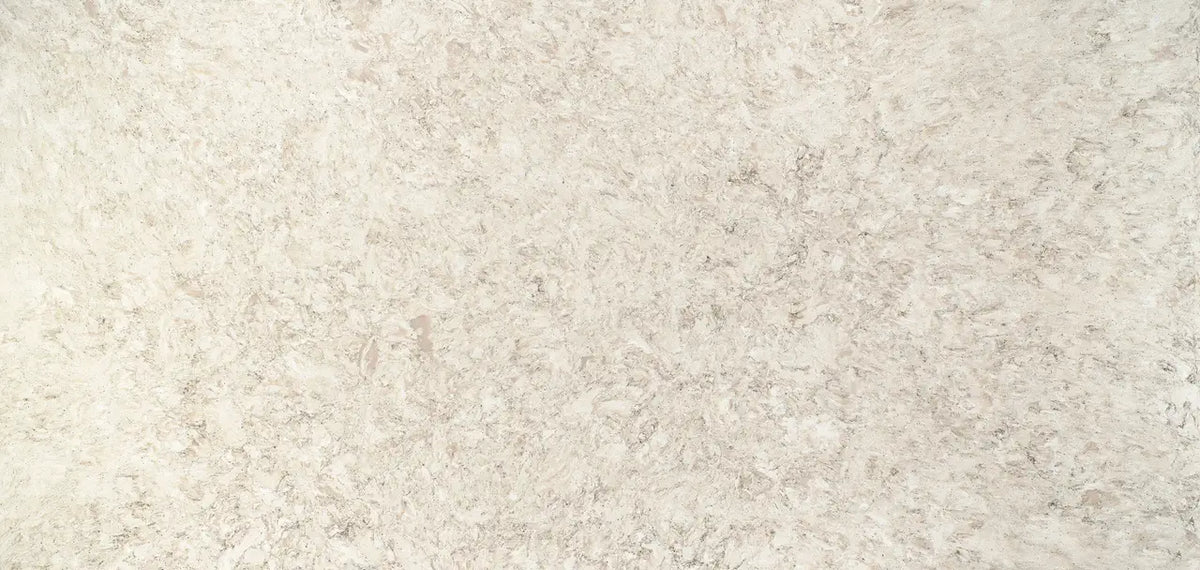 Quartz slab surface with cream and beige speckled pattern and smooth polished finish — premium countertop fabrication by Signature Stone Las Vegas