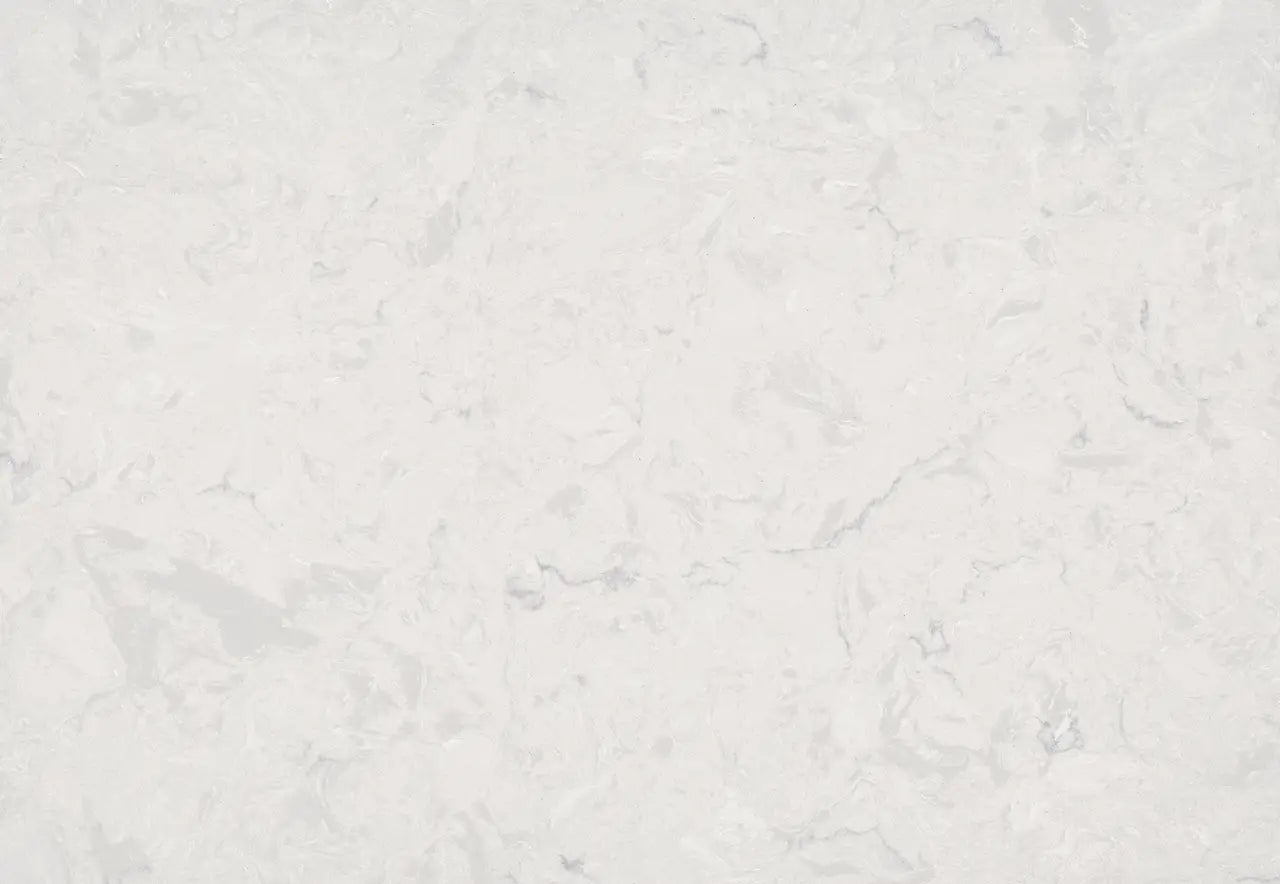 Weybourne quartz surface with subtle gray veining and polished finish — custom countertops fabricated and installed by Signature Stone LV