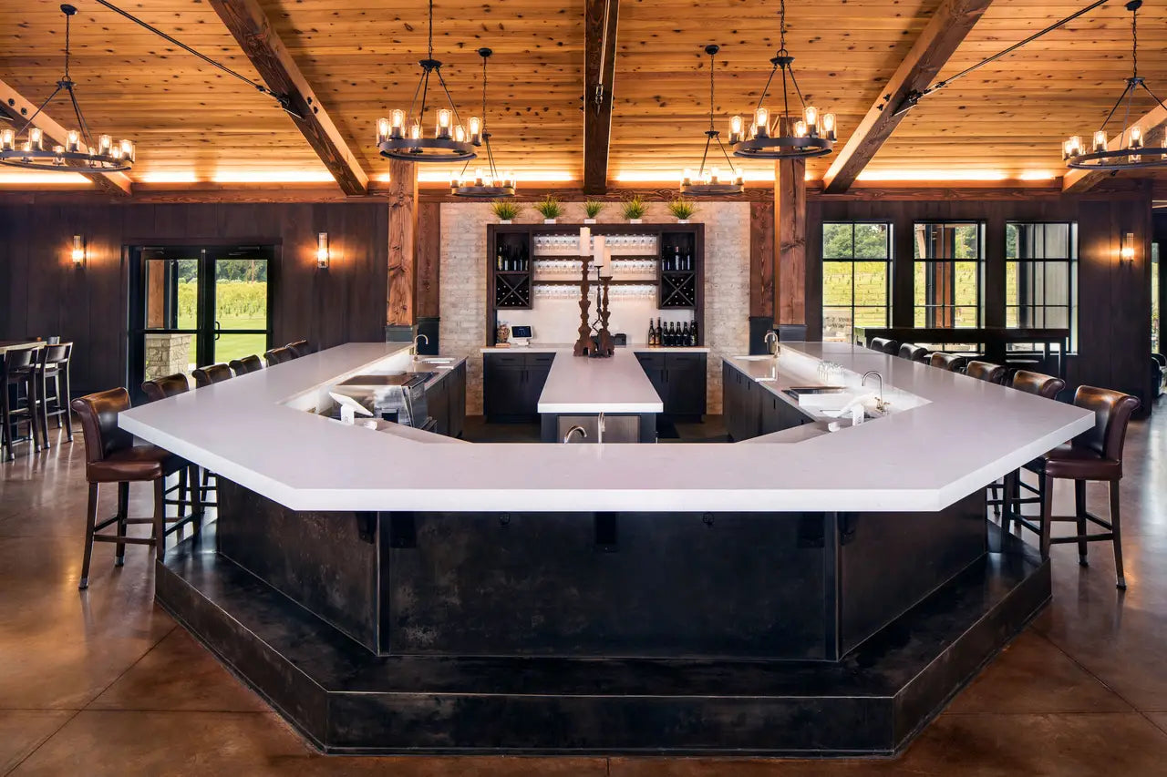 Weybourne quartz kitchen island with white surface and sleek edges — premium stone countertops installed by Signature Stone Las Vegas