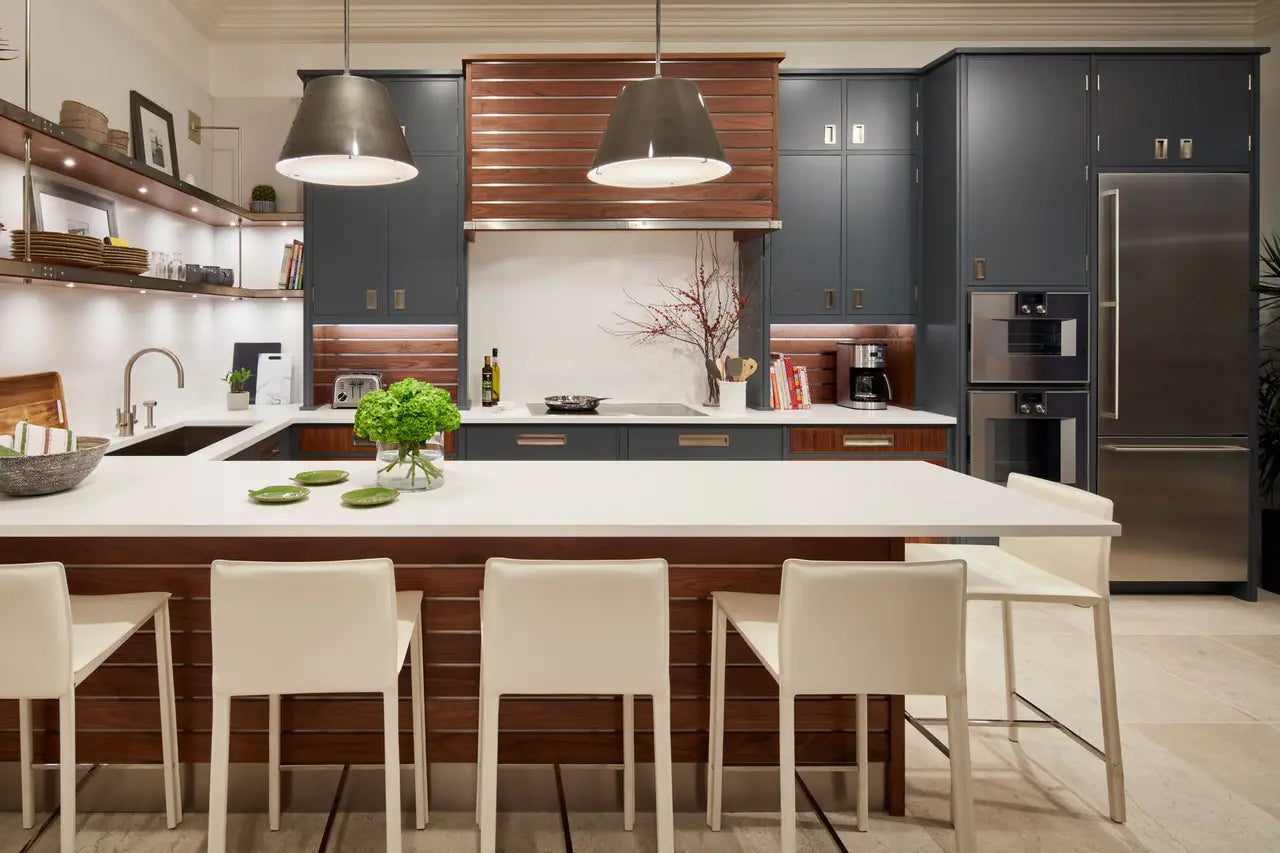 White Cliff quartz kitchen island and countertops with polished finish and clean edges — expert countertop fabrication by Signature Stone Las Vegas