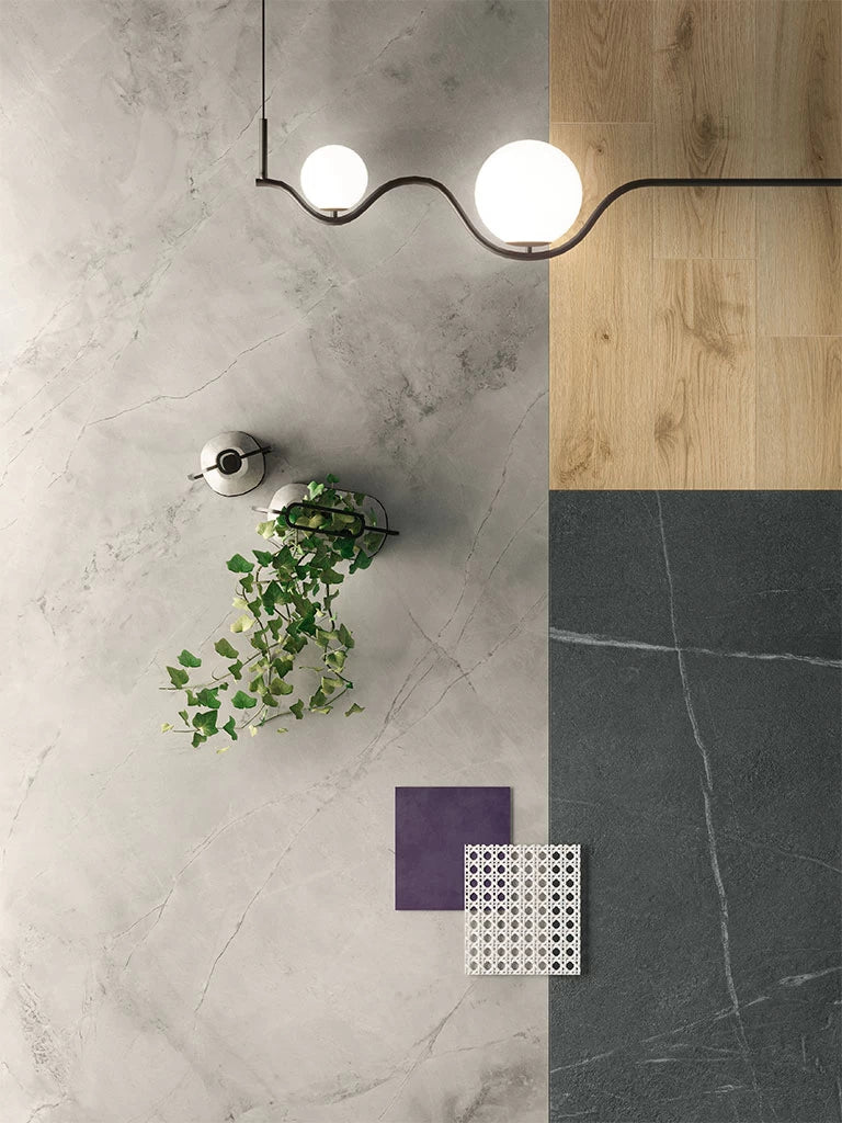 White Cloud marble flooring with subtle gray veining and polished finish — ideal for custom countertops fabricated and installed by Signature Stone LV