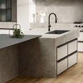 White Cloud quartz kitchen island with integrated sink and sleek white finish — premium stone countertops installed by Signature Stone Las Vegas