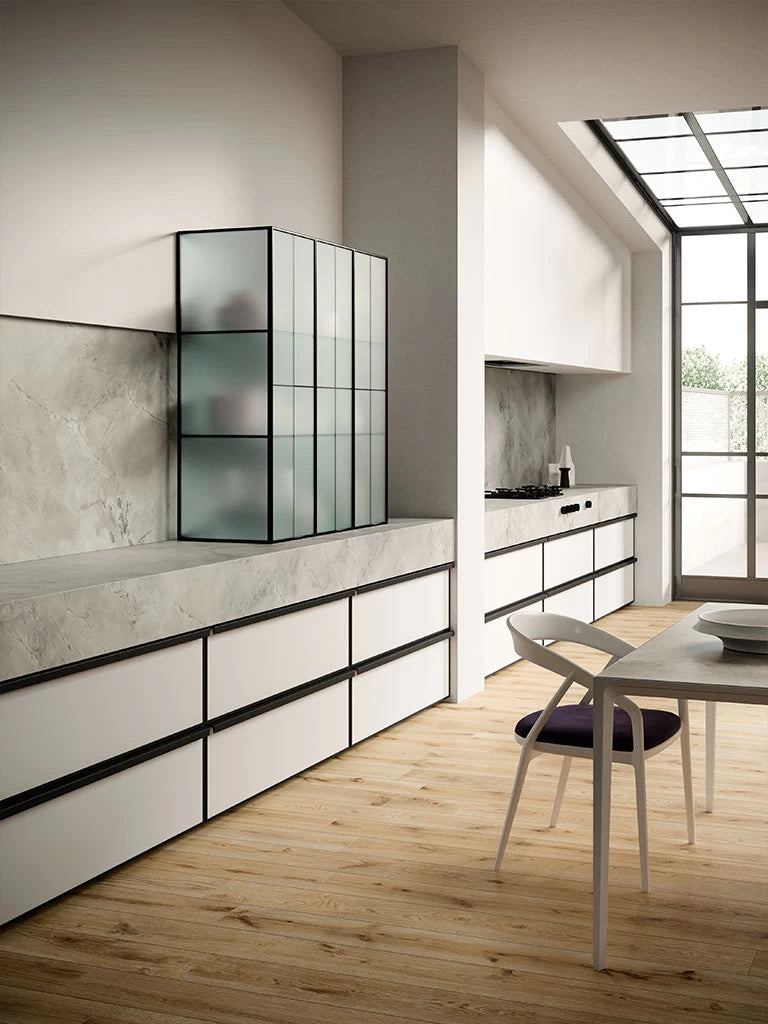 White Cloud quartz kitchen countertops with sleek white finish and matching backsplash — expert countertop fabrication by Signature Stone Las Vegas