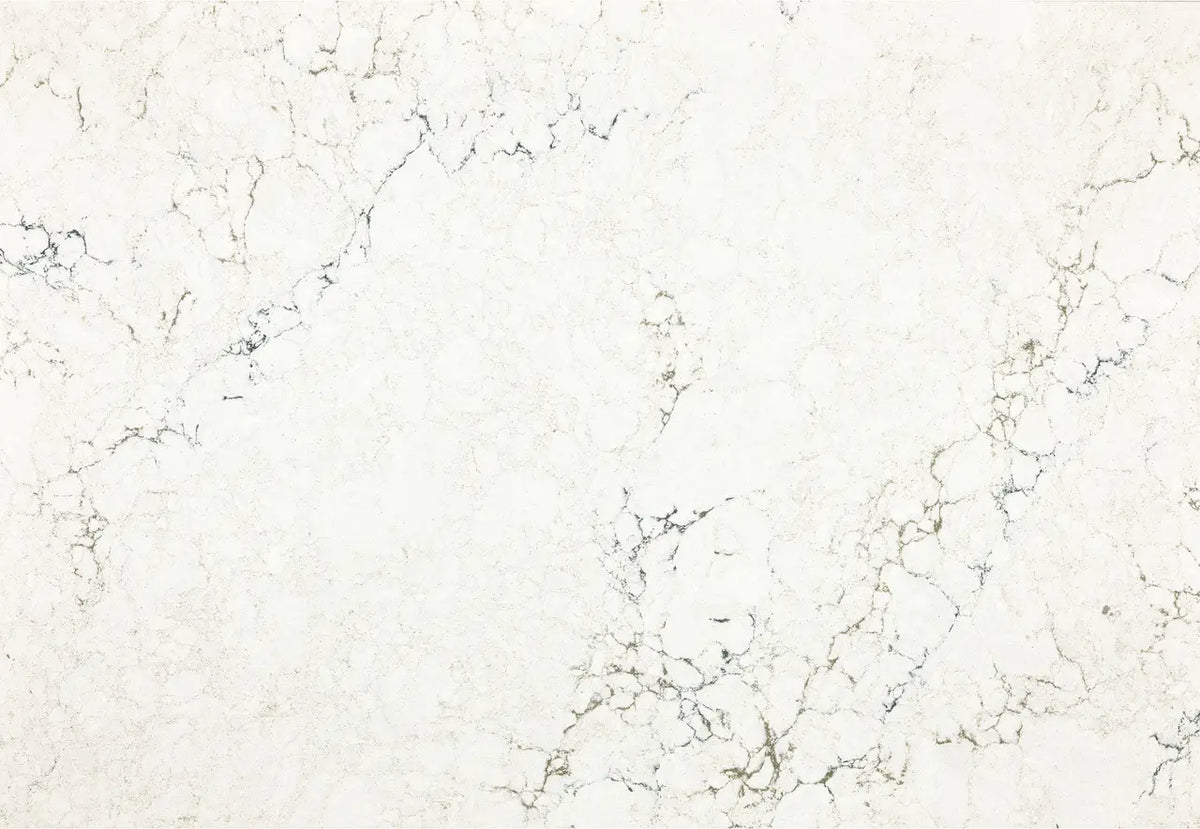 Marble surface with elegant white background and subtle gray veining pattern — premium countertop fabrication by Signature Stone Las Vegas