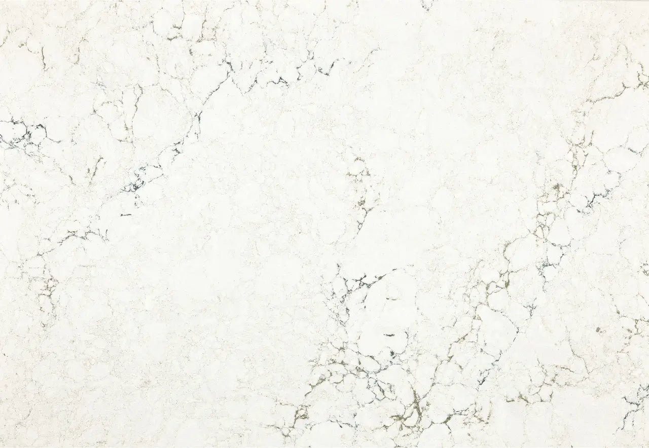 Marble surface with elegant white background and subtle gray veining pattern — premium countertop fabrication by Signature Stone Las Vegas