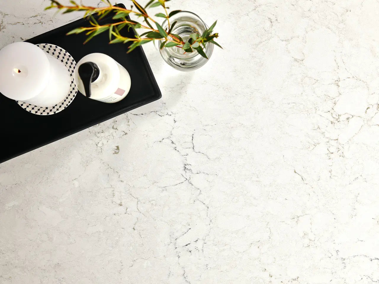 Whitendale quartz surface with white marble-like veining and polished finish — elegant custom countertops fabricated and installed by Signature Stone LV