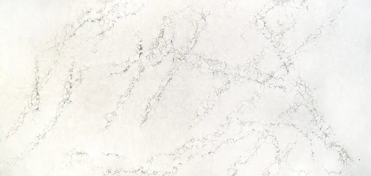 Whitendale quartz surface with soft white base and delicate gray veining pattern — elegant stone countertops installed by Signature Stone Las Vegas