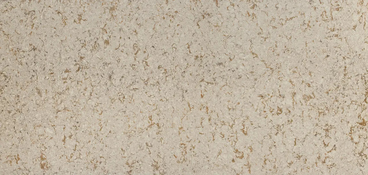 Windermere quartz slab surface with cream base and golden brown veining in polished finish — custom countertops fabricated and installed by Signature Stone LV
