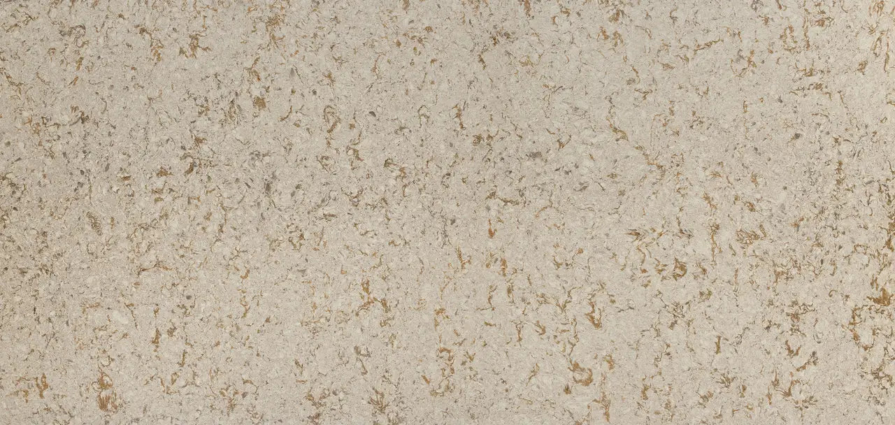 Windermere quartz slab surface with cream base and golden brown veining in polished finish — custom countertops fabricated and installed by Signature Stone LV