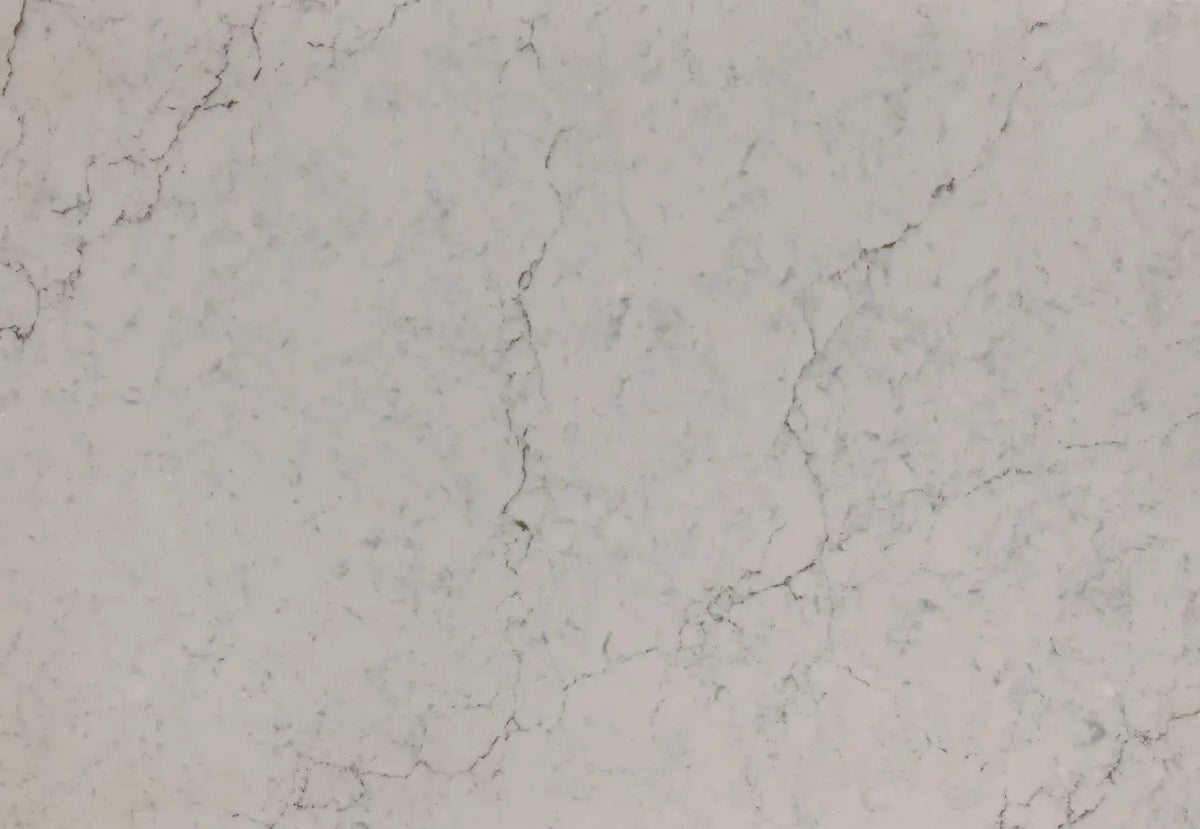 Windrush marble slab with soft white base and delicate gray veining throughout — custom countertops fabricated and installed by Signature Stone LV