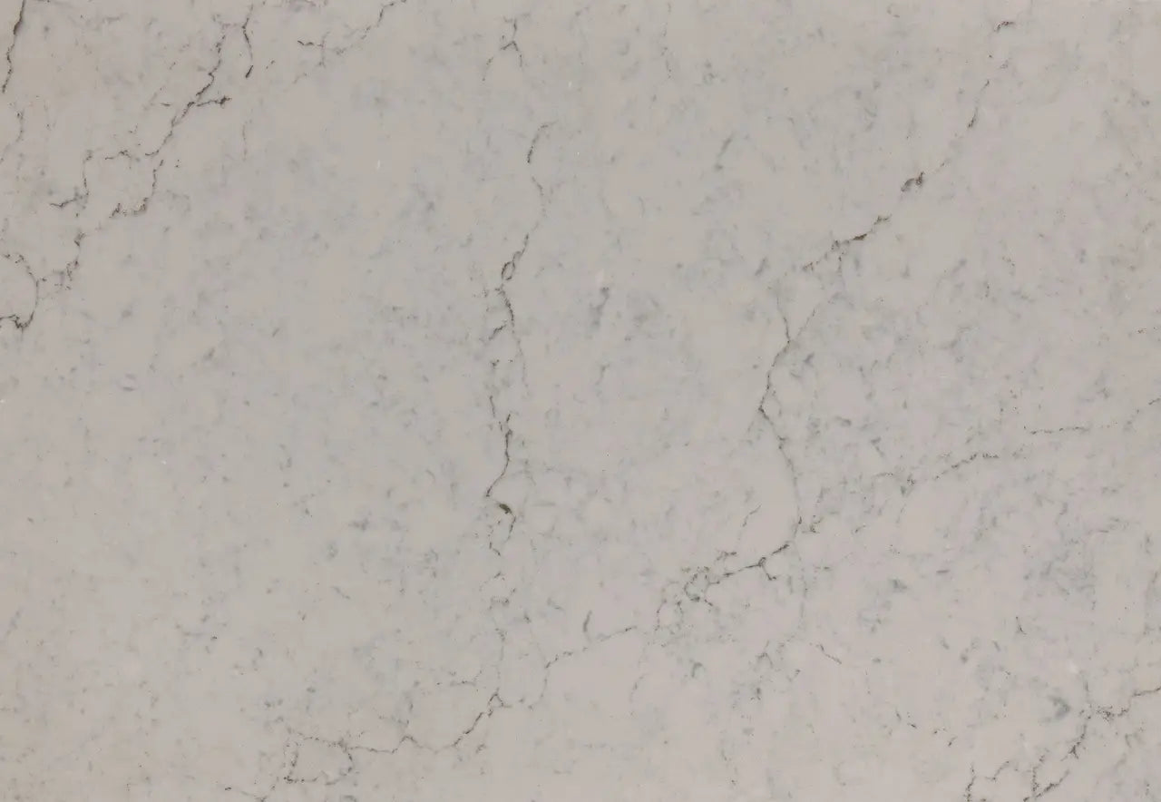 Windrush marble slab with soft white base and delicate gray veining throughout — custom countertops fabricated and installed by Signature Stone LV