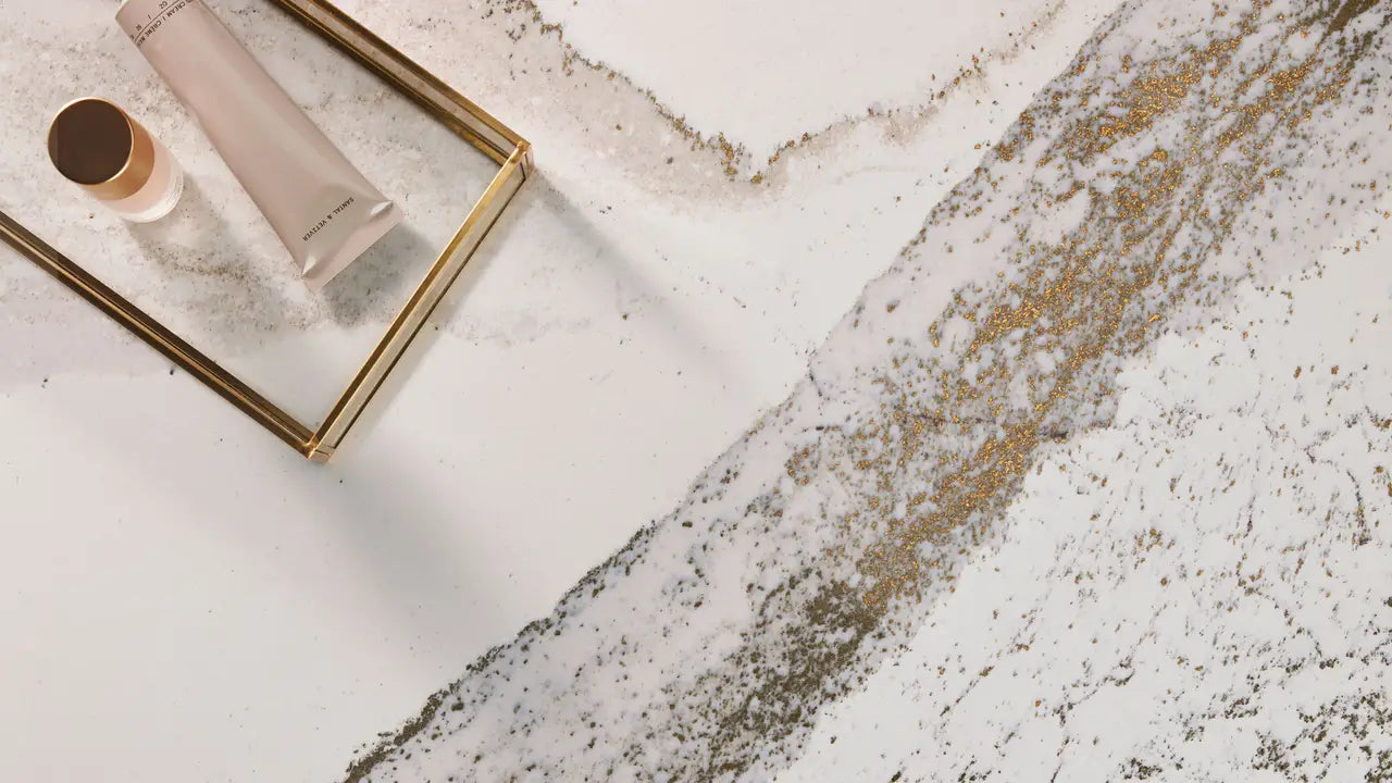 Windsor Brass stone surface with white and gold veining pattern and polished finish — premium countertop fabrication by Signature Stone Las Vegas
