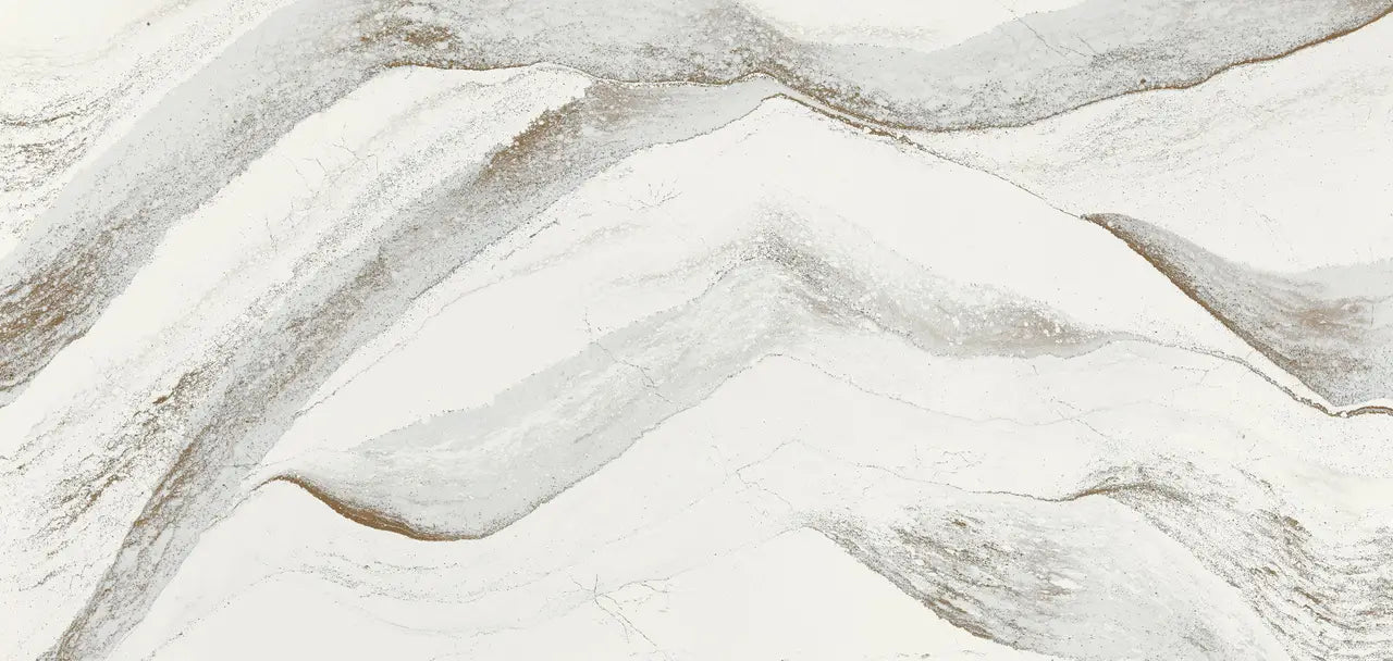 Windsor Brass quartzite slab featuring flowing cream and gray veining with polished finish — elegant stone countertops installed by Signature Stone Las Vegas