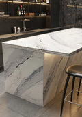 Windsor Steel Satin Ridge quartz kitchen island with dramatic gray veining and waterfall edge — premium stone countertops installed by Signature Stone Las Vegas