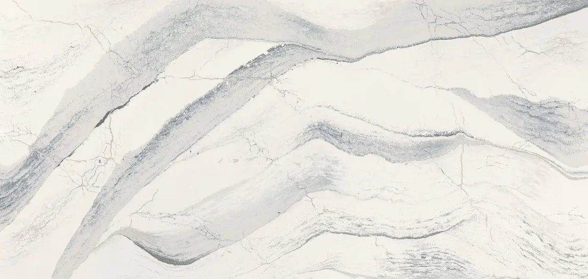 Windsor Steel Satin Ridge quartz surface with flowing gray veining and polished finish — premium countertop fabrication by Signature Stone Las Vegas