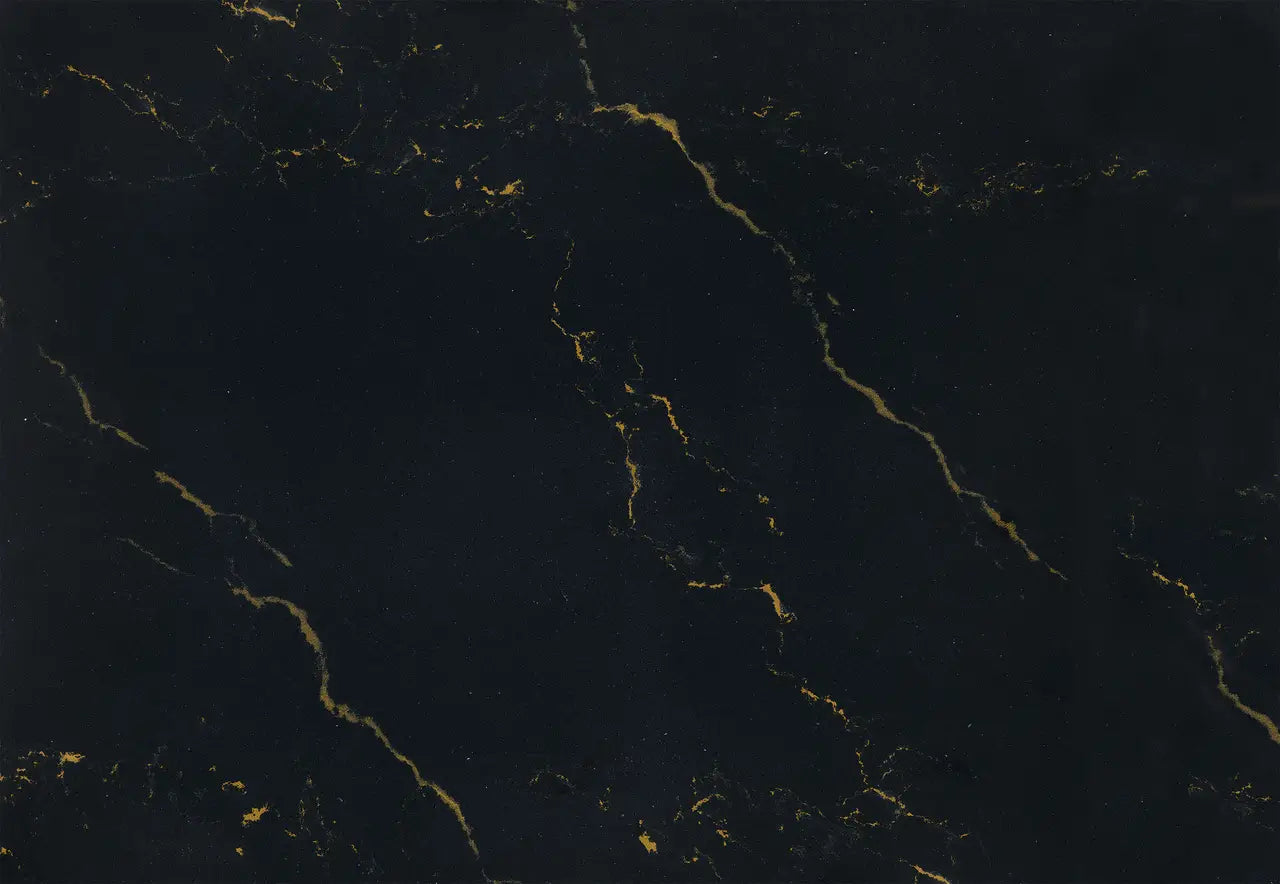 Dark marble surface with gold veining and polished finish — premium countertop fabrication by Signature Stone Las Vegas